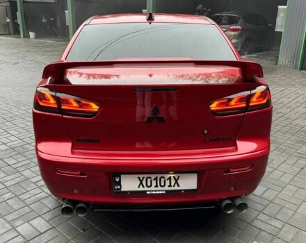 Червоний Міцубісі Lancer, об'ємом двигуна 2 л та пробігом 137 тис. км за 8500 $, фото 1 на Automoto.ua