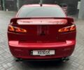 Червоний Міцубісі Lancer, об'ємом двигуна 2 л та пробігом 137 тис. км за 8500 $, фото 1 на Automoto.ua