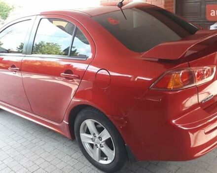 Червоний Міцубісі Lancer, об'ємом двигуна 2 л та пробігом 141 тис. км за 7600 $, фото 7 на Automoto.ua