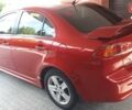 Червоний Міцубісі Lancer, об'ємом двигуна 2 л та пробігом 141 тис. км за 7600 $, фото 7 на Automoto.ua