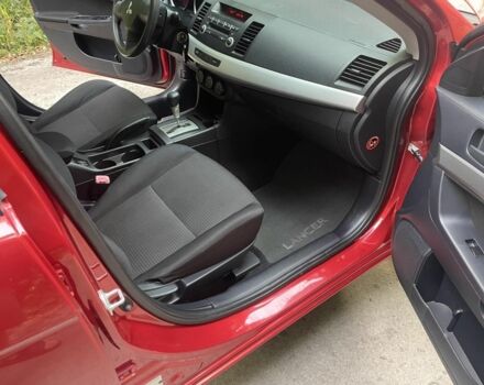 Красный Мицубиси Лансер, объемом двигателя 1.5 л и пробегом 124 тыс. км за 6300 $, фото 7 на Automoto.ua