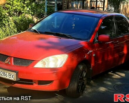 Червоний Міцубісі Lancer, об'ємом двигуна 1.6 л та пробігом 266 тис. км за 2900 $, фото 1 на Automoto.ua