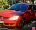Червоний Міцубісі Lancer, об'ємом двигуна 1.6 л та пробігом 266 тис. км за 2900 $, фото 1 на Automoto.ua
