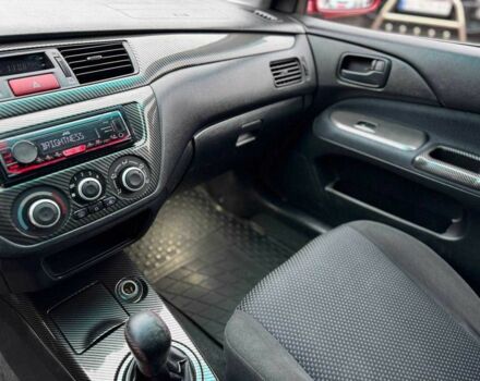 Красный Мицубиси Лансер, объемом двигателя 1.6 л и пробегом 215 тыс. км за 4500 $, фото 13 на Automoto.ua