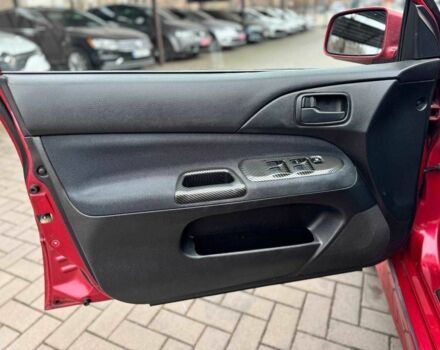 Красный Мицубиси Лансер, объемом двигателя 1.6 л и пробегом 215 тыс. км за 4500 $, фото 11 на Automoto.ua