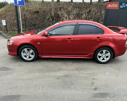 Красный Мицубиси Лансер, объемом двигателя 2 л и пробегом 330 тыс. км за 5250 $, фото 25 на Automoto.ua
