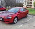Красный Мицубиси Лансер, объемом двигателя 1.5 л и пробегом 233 тыс. км за 6500 $, фото 1 на Automoto.ua