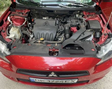 Красный Мицубиси Лансер, объемом двигателя 1.5 л и пробегом 124 тыс. км за 6300 $, фото 9 на Automoto.ua