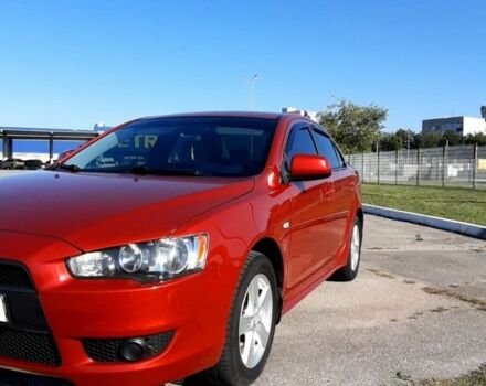 Красный Мицубиси Лансер, объемом двигателя 2 л и пробегом 110 тыс. км за 7500 $, фото 5 на Automoto.ua