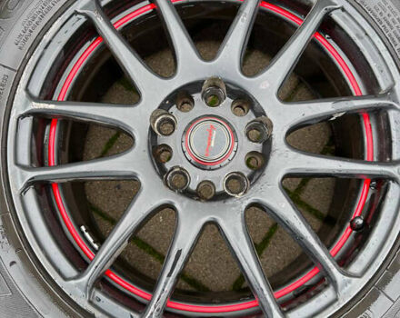 Красный Мицубиси Лансер, объемом двигателя 2 л и пробегом 143 тыс. км за 5200 $, фото 28 на Automoto.ua