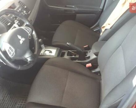 Червоний Міцубісі Lancer, об'ємом двигуна 2 л та пробігом 141 тис. км за 7600 $, фото 14 на Automoto.ua