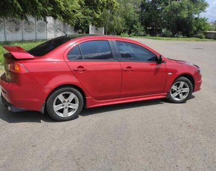Червоний Міцубісі Lancer, об'ємом двигуна 2 л та пробігом 301 тис. км за 6200 $, фото 4 на Automoto.ua