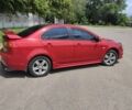 Червоний Міцубісі Lancer, об'ємом двигуна 2 л та пробігом 301 тис. км за 6200 $, фото 4 на Automoto.ua