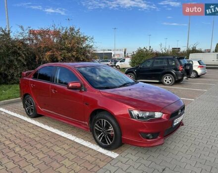 Красный Мицубиси Лансер, объемом двигателя 2 л и пробегом 227 тыс. км за 7000 $, фото 7 на Automoto.ua