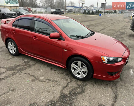 Красный Мицубиси Лансер, объемом двигателя 2 л и пробегом 330 тыс. км за 5250 $, фото 4 на Automoto.ua