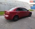 Красный Мицубиси Лансер, объемом двигателя 1.5 л и пробегом 210 тыс. км за 5799 $, фото 4 на Automoto.ua