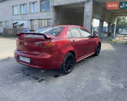 Червоний Міцубісі Lancer, об'ємом двигуна 2 л та пробігом 179 тис. км за 6499 $, фото 3 на Automoto.ua