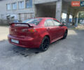 Червоний Міцубісі Lancer, об'ємом двигуна 2 л та пробігом 179 тис. км за 6499 $, фото 3 на Automoto.ua