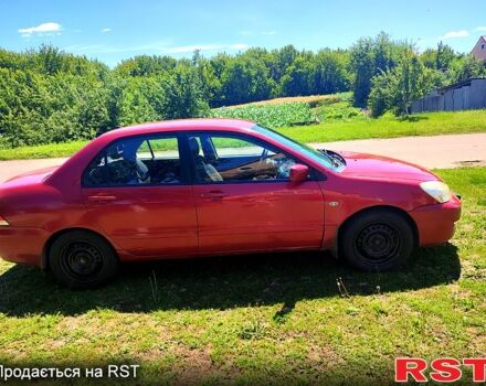 Красный Мицубиси Лансер, объемом двигателя 1.6 л и пробегом 140 тыс. км за 5500 $, фото 1 на Automoto.ua