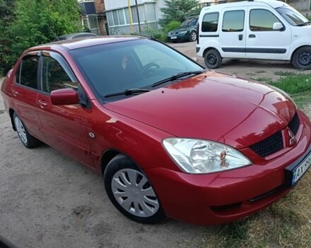 Червоний Міцубісі Lancer, об'ємом двигуна 1.6 л та пробігом 227 тис. км за 5300 $, фото 2 на Automoto.ua