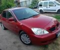 Червоний Міцубісі Lancer, об'ємом двигуна 1.6 л та пробігом 227 тис. км за 5300 $, фото 2 на Automoto.ua
