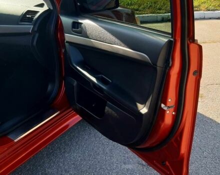 Красный Мицубиси Лансер, объемом двигателя 2 л и пробегом 110 тыс. км за 7500 $, фото 17 на Automoto.ua