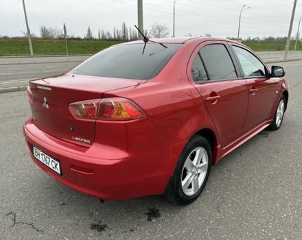 Красный Мицубиси Лансер, объемом двигателя 2 л и пробегом 366 тыс. км за 6500 $, фото 5 на Automoto.ua