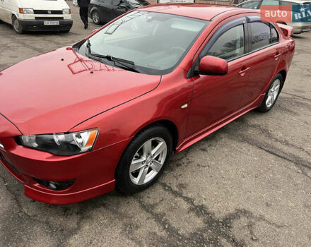 Красный Мицубиси Лансер, объемом двигателя 2 л и пробегом 330 тыс. км за 5250 $, фото 11 на Automoto.ua