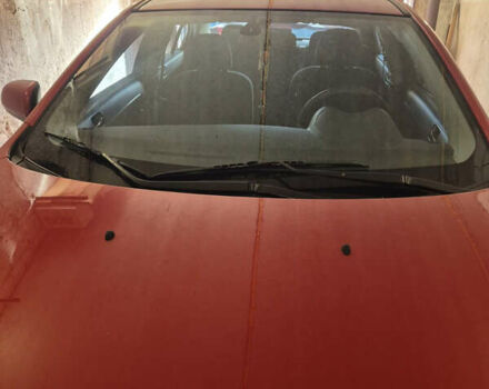 Красный Мицубиси Лансер, объемом двигателя 2 л и пробегом 65 тыс. км за 9300 $, фото 3 на Automoto.ua