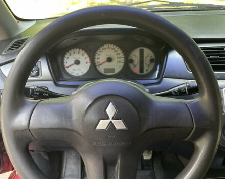 Червоний Міцубісі Lancer, об'ємом двигуна 1.6 л та пробігом 270 тис. км за 5699 $, фото 41 на Automoto.ua