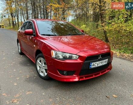 Красный Мицубиси Лансер, объемом двигателя 2 л и пробегом 197 тыс. км за 6500 $, фото 7 на Automoto.ua