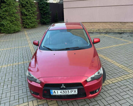 Красный Мицубиси Лансер, объемом двигателя 2 л и пробегом 143 тыс. км за 5200 $, фото 6 на Automoto.ua