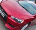 Червоний Міцубісі Lancer, об'ємом двигуна 2 л та пробігом 214 тис. км за 7500 $, фото 1 на Automoto.ua