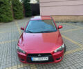 Красный Мицубиси Лансер, объемом двигателя 2 л и пробегом 143 тыс. км за 5200 $, фото 6 на Automoto.ua