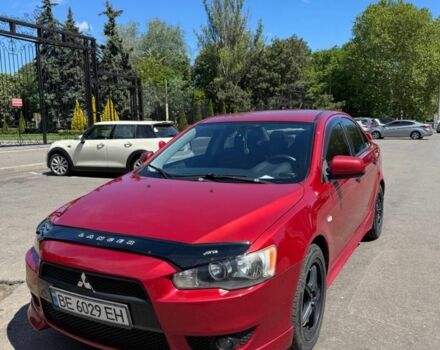 Червоний Міцубісі Lancer, об'ємом двигуна 2 л та пробігом 255 тис. км за 5200 $, фото 2 на Automoto.ua