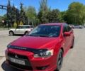 Червоний Міцубісі Lancer, об'ємом двигуна 2 л та пробігом 255 тис. км за 5200 $, фото 2 на Automoto.ua