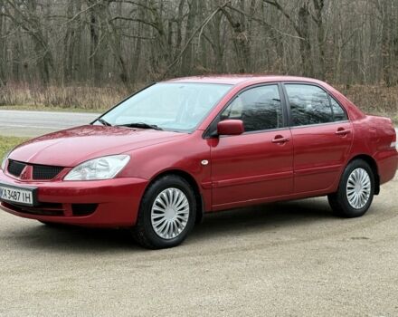 Червоний Міцубісі Lancer, об'ємом двигуна 1.6 л та пробігом 220 тис. км за 4600 $, фото 3 на Automoto.ua
