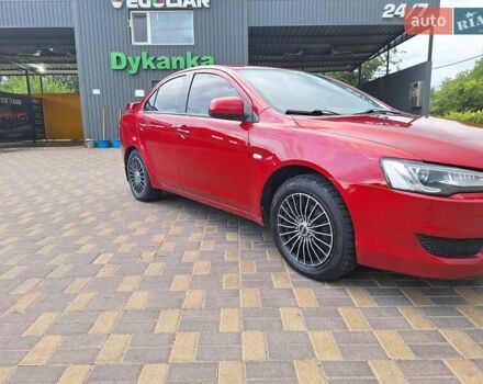 Красный Мицубиси Лансер, объемом двигателя 1.5 л и пробегом 227 тыс. км за 6700 $, фото 9 на Automoto.ua