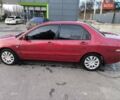 Червоний Міцубісі Lancer, об'ємом двигуна 1.58 л та пробігом 140 тис. км за 6000 $, фото 9 на Automoto.ua