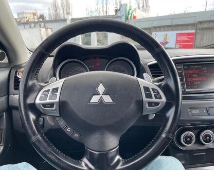 Червоний Міцубісі Lancer, об'ємом двигуна 1.8 л та пробігом 189 тис. км за 8990 $, фото 21 на Automoto.ua