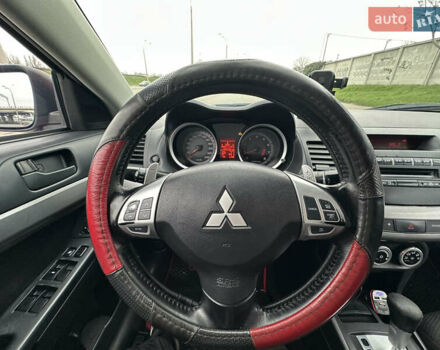 Червоний Міцубісі Lancer, об'ємом двигуна 2 л та пробігом 366 тис. км за 6500 $, фото 31 на Automoto.ua