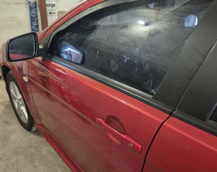 Красный Мицубиси Лансер, объемом двигателя 2 л и пробегом 65 тыс. км за 9300 $, фото 8 на Automoto.ua