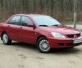 Червоний Міцубісі Lancer, об'ємом двигуна 1.6 л та пробігом 220 тис. км за 4600 $, фото 1 на Automoto.ua