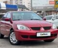 Червоний Міцубісі Lancer, об'ємом двигуна 1.58 л та пробігом 223 тис. км за 6400 $, фото 1 на Automoto.ua