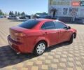 Красный Мицубиси Лансер, объемом двигателя 1.5 л и пробегом 220 тыс. км за 6300 $, фото 2 на Automoto.ua