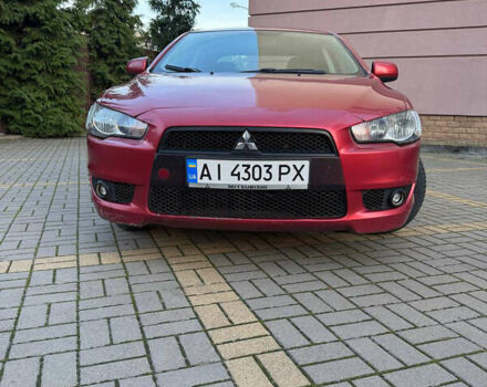 Красный Мицубиси Лансер, объемом двигателя 2 л и пробегом 143 тыс. км за 5200 $, фото 7 на Automoto.ua