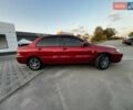 Червоний Міцубісі Lancer, об'ємом двигуна 1.6 л та пробігом 257 тис. км за 4600 $, фото 3 на Automoto.ua