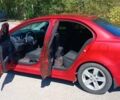 Красный Мицубиси Лансер, объемом двигателя 2 л и пробегом 139 тыс. км за 7000 $, фото 11 на Automoto.ua
