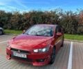 Червоний Міцубісі Lancer, об'ємом двигуна 2 л та пробігом 229 тис. км за 6700 $, фото 1 на Automoto.ua