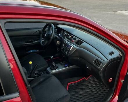 Червоний Міцубісі Lancer, об'ємом двигуна 1.6 л та пробігом 257 тис. км за 4600 $, фото 8 на Automoto.ua